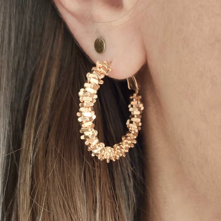 SOL hoop earrings and other Purchase Wholesale lentes sol replicas. Free Returns & Net 60 Terms on Faire trending on Faire.