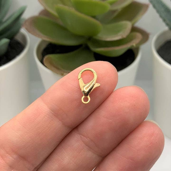 Guerrilla Charm - Wholesale Craft Supplies - 7x12 mm KC Gold Lobster Claw Clasps1