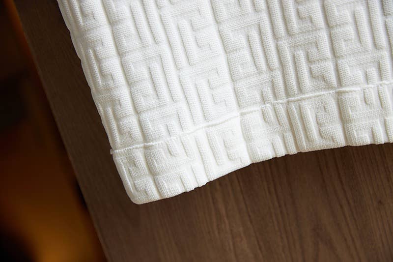 Productseeker - Wholesale Top & Skirt Set - Women's - SET129 Swastika Pattern Knit Top & Hip Skirt Set 12