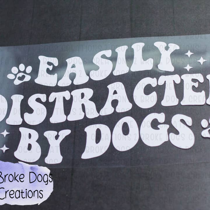 Easily Distracted By Dogs Vinyl Decal for wholesale by 2 Broke Dogs Creations