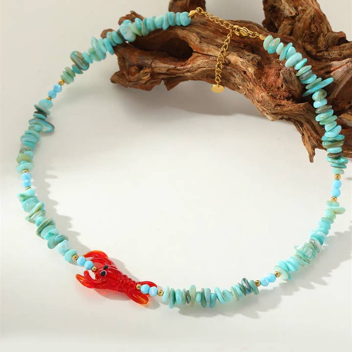 Halskæde med naturlige stenperler og hummerlås Ocean & Coastal Smykker for engroshandel hos Peachy Accessories LLC