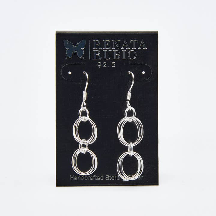 Set med halsband, armband och örhängen i sterling silver med böjda dubbla ovala länkar. för wholesale av Renata Rubio 92.5