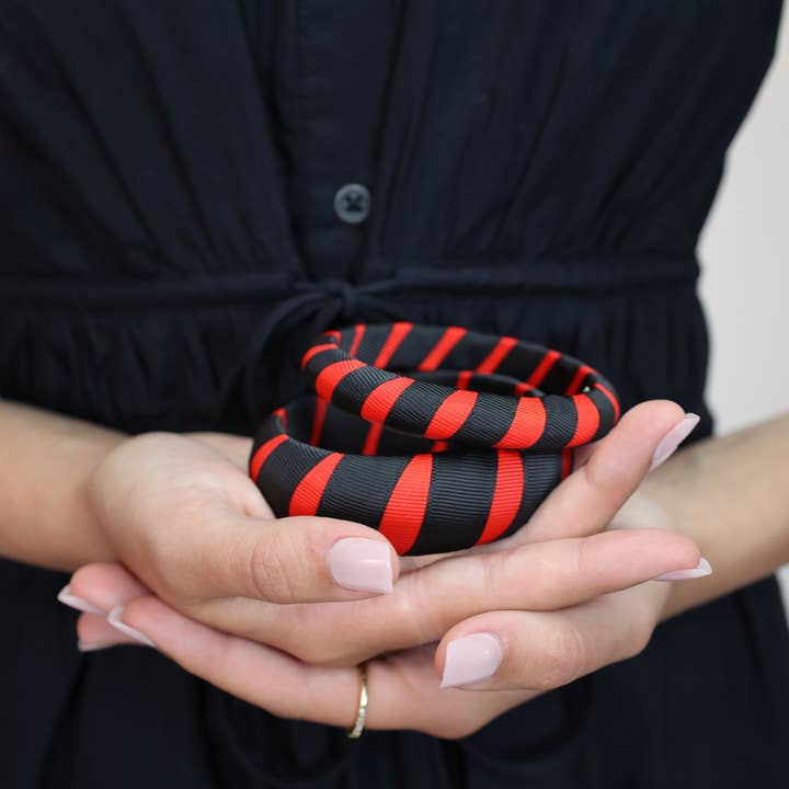 Arches-armbåndet for engroshandel hos C. Tonsmeire