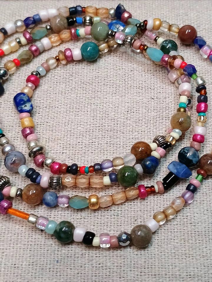 Wanderlust Wristlet for wholesale by American Taina Crafts