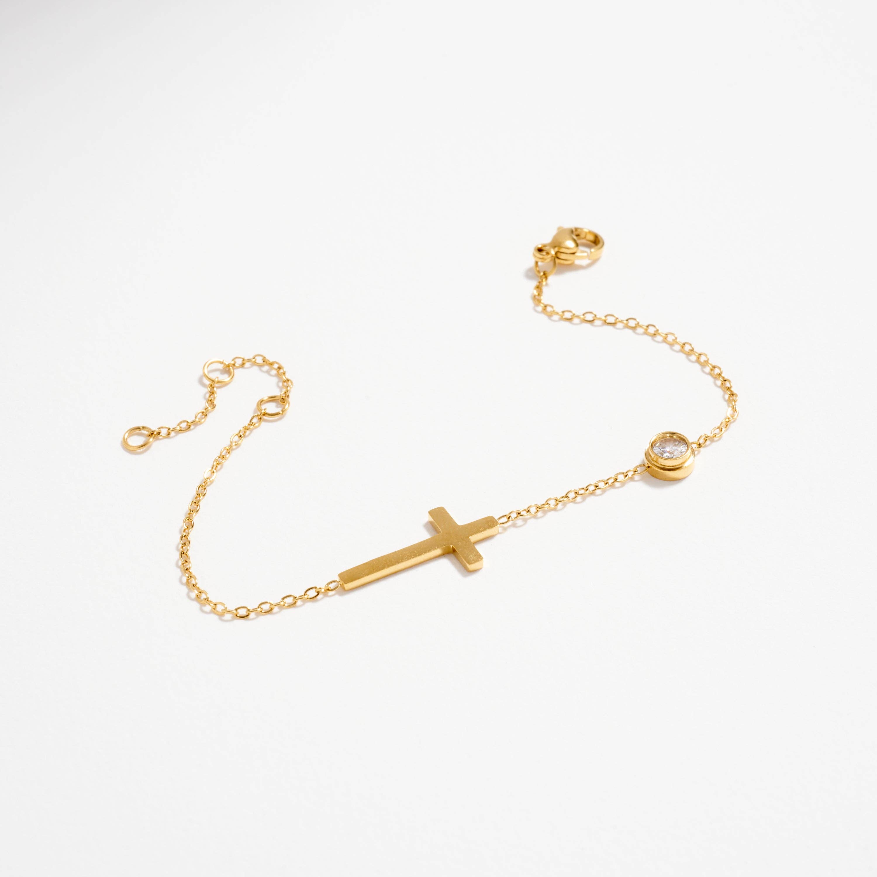 GD Gold-Tone Cross Bracelet with CZ Accent – Dainty Adjustable Faith Bracelet for wholesale on Faire2