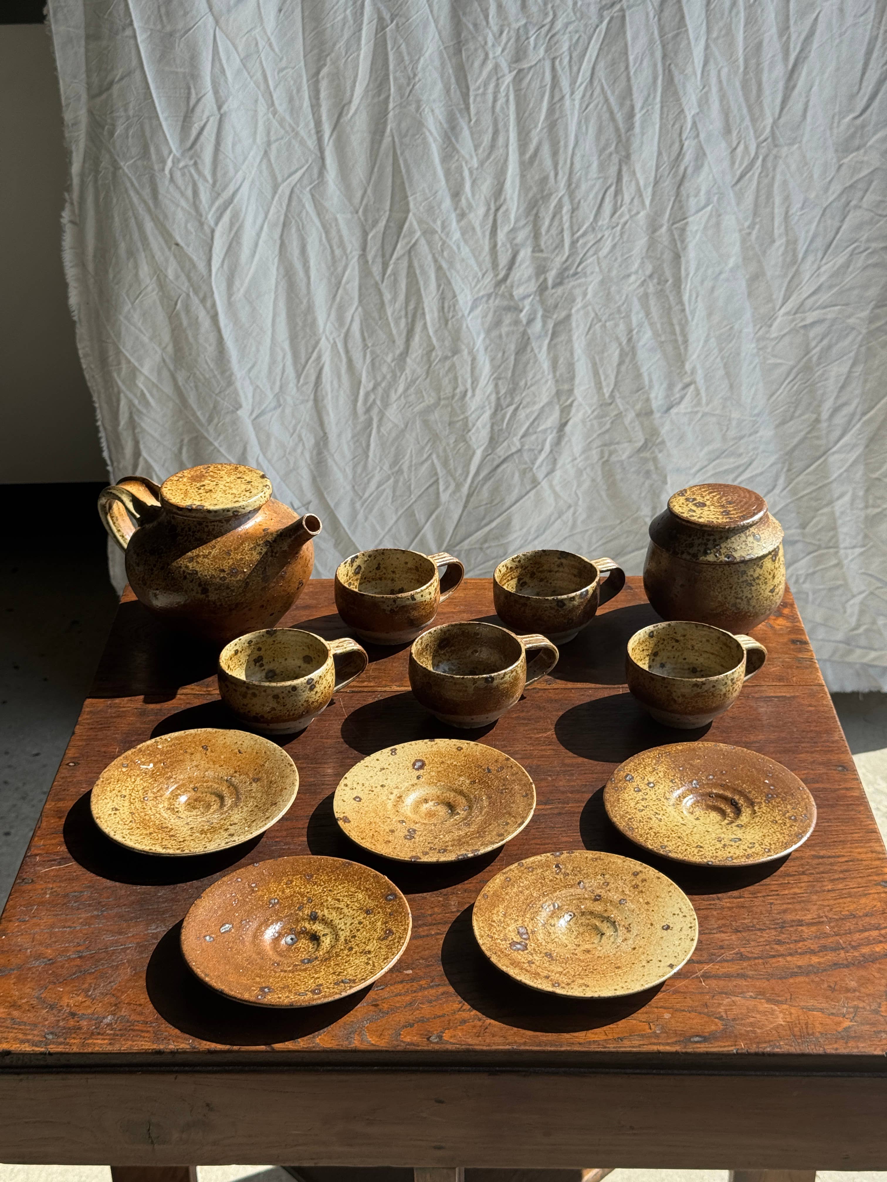 brown Small stoneware tea set with teapot, cups, sugar bowl for wholesale on Faire7