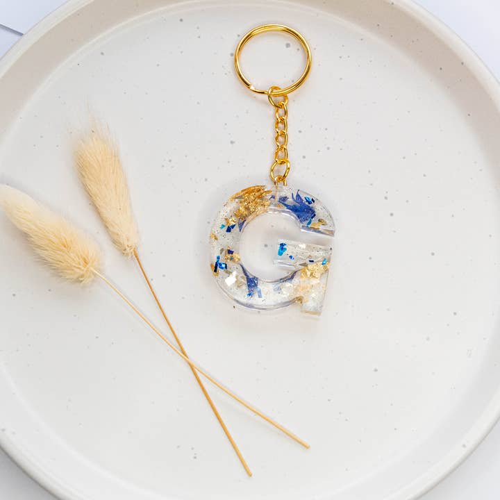 Letter Key Chain with real flowers and glitter in resin for wholesale by Allie and Posie