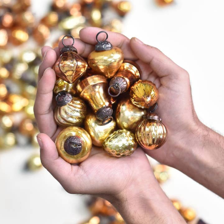100 Pieces Glass Gold Amber Unique Ornaments for wholesale on Faire