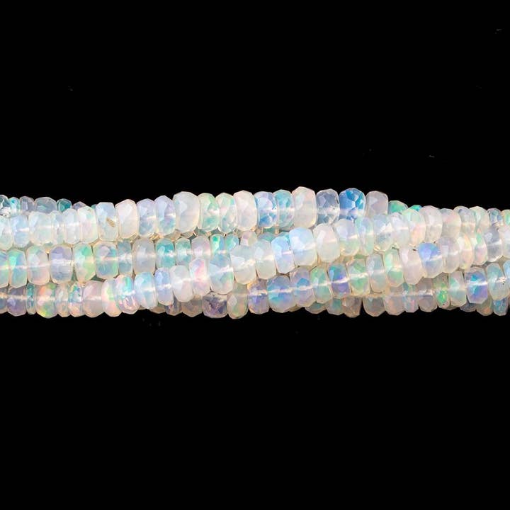 25 mm Ethiopische opaal gefacetteerde rondelkralen 16 inch 230 voor wholesale door Beads of Cambay