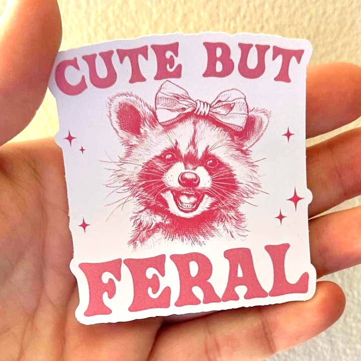 Cute But Feral - Pink Coquette Sticker/Magnet for wholesale by Oily Graphic Creations