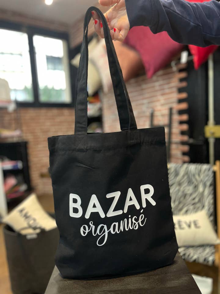 “Organized bazaar” black tote bag for wholesale by Toiles Chics