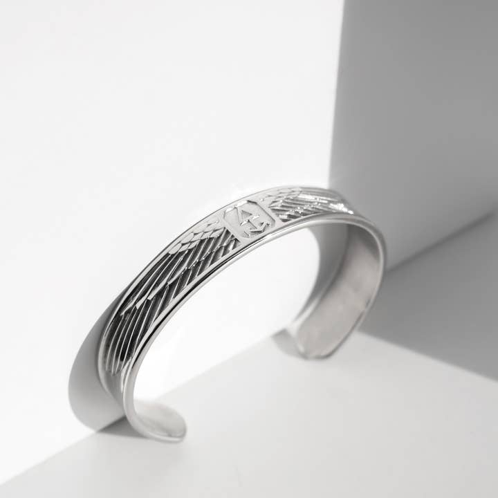 Armreif WINGED SUN for wholesale by ROCK & STEEL