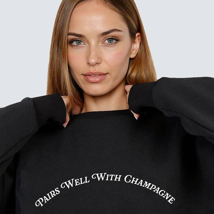 Pairs Well With Champagne® Sweatshirt for wholesale by House of Lulu