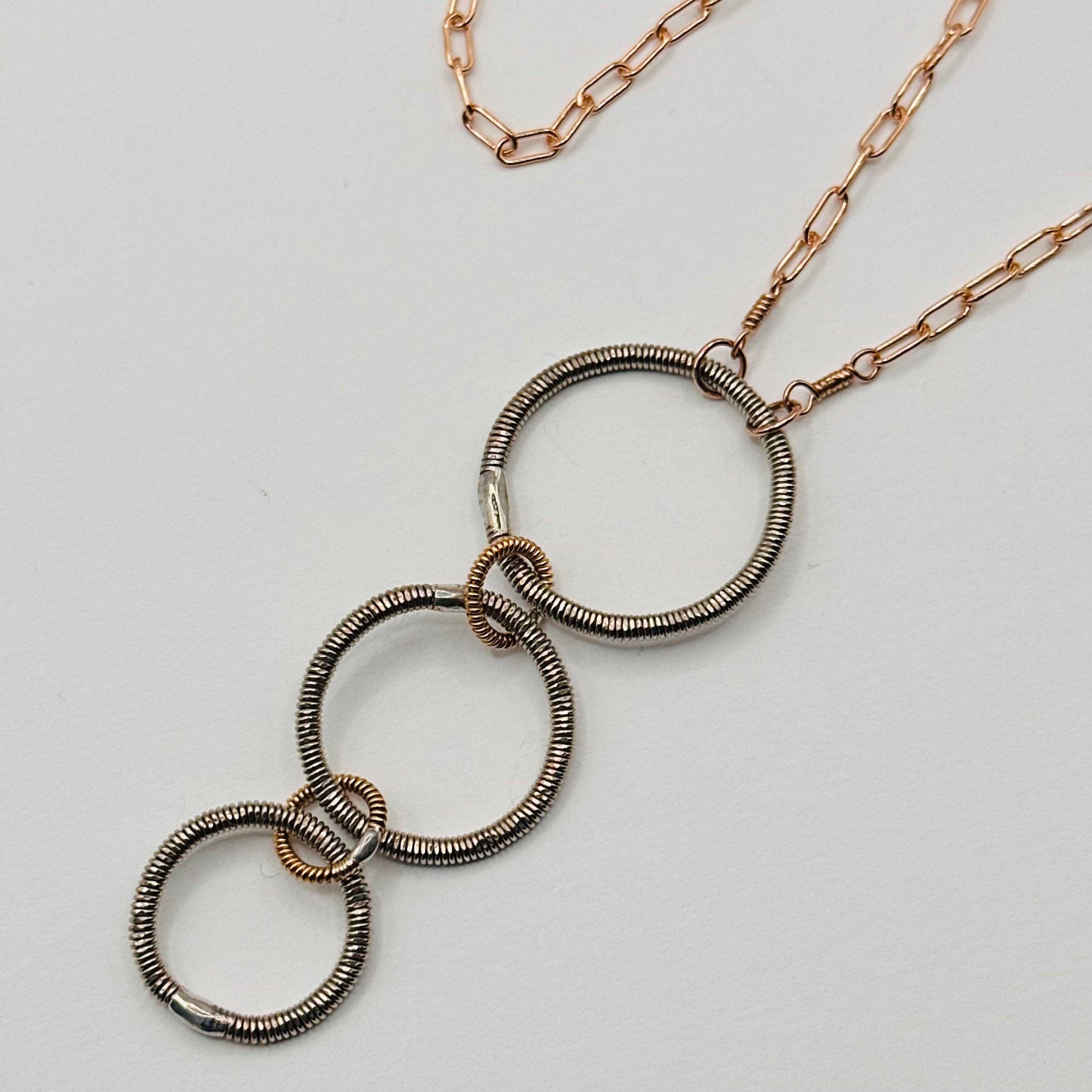 Middle Sister Designs - Wholesale Pendant/Charm Necklace - Long Triple Circle Bass String Necklace3