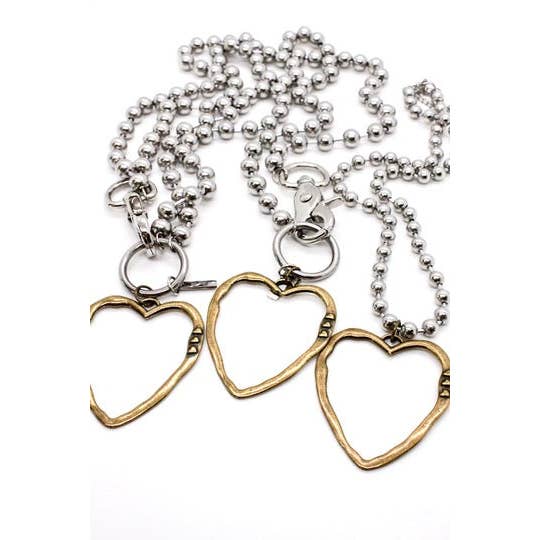 Collier chaîne en argent convertible avec pendentif cœur découpé en laiton pour la vente par LIZOU