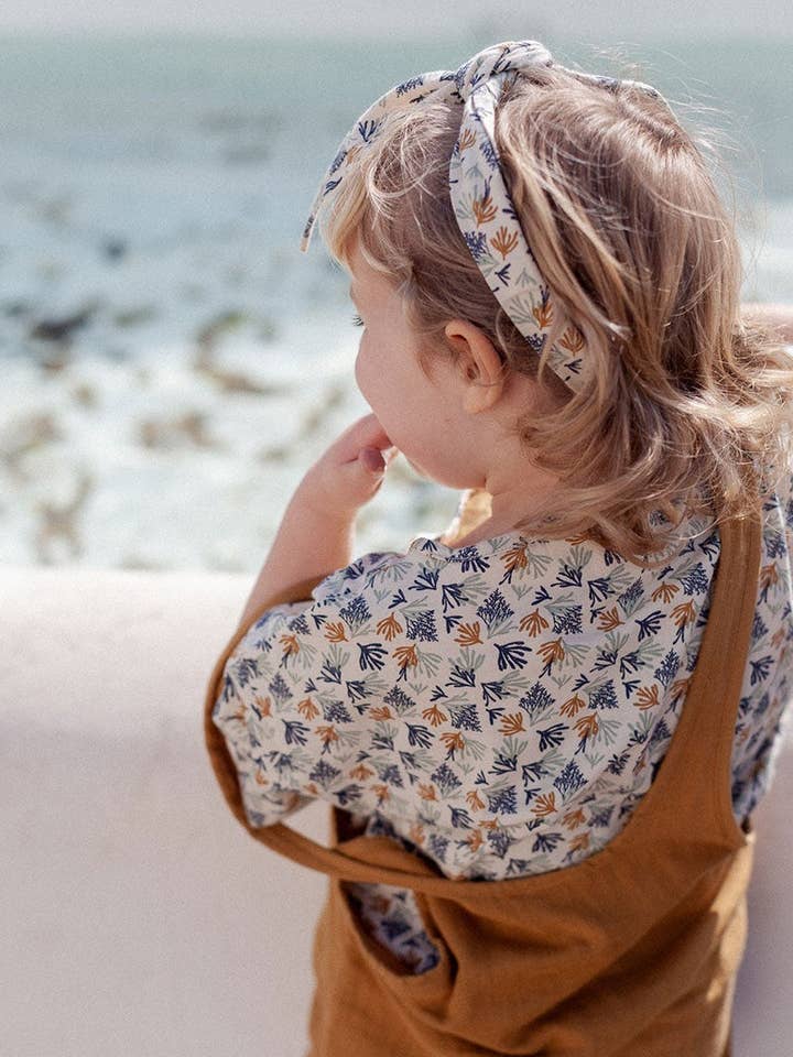 T-shirt Erin Coral por atacado de Tiralahilacha