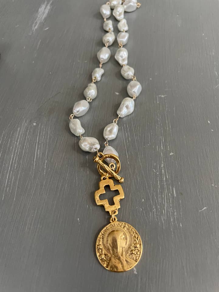 Porcelain baroque pearl necklace w/religious pendant for wholesale by MORGANandME Designs