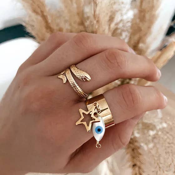 Karma ring van roestvrij staal met parelmoer oog en ster voor wholesale door Island Jewels