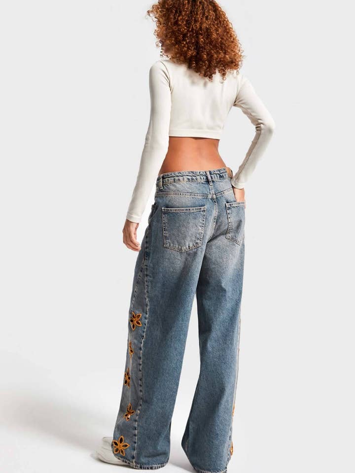 Blue Floral cutout Embroidered Distressed jeans for wholesale on Faire6
