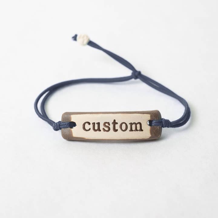 Braccialetti Originali Personalizzati su Cordoncino Elastico per la vendita all'ingrosso da parte di MudLOVE