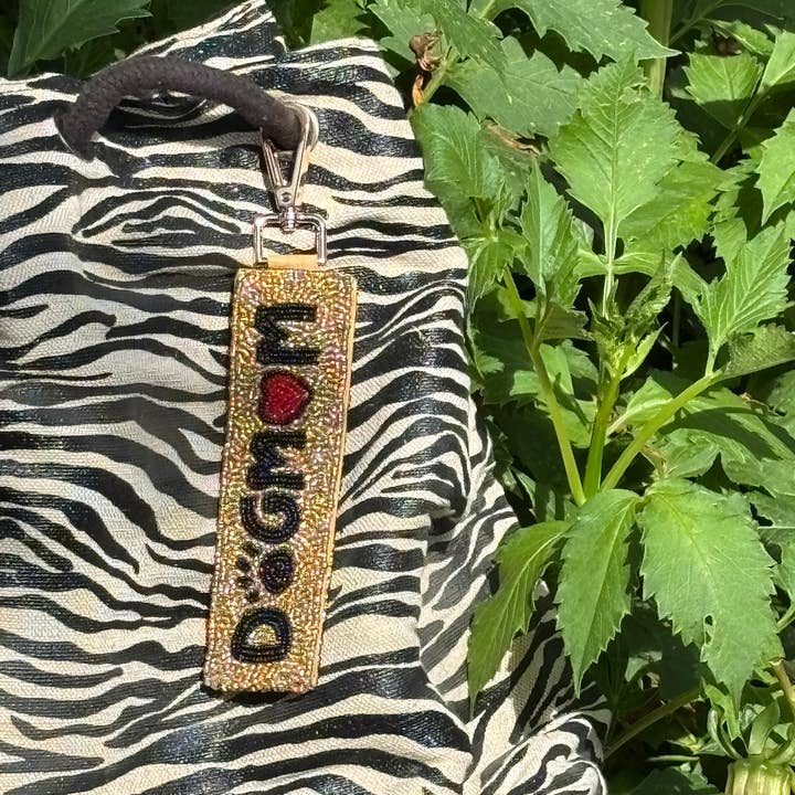 Dog Mom Beaded Key Charm and other Purchase Wholesale paw print keychain. Free Returns & Net 60 Terms on Faire trending on Faire.