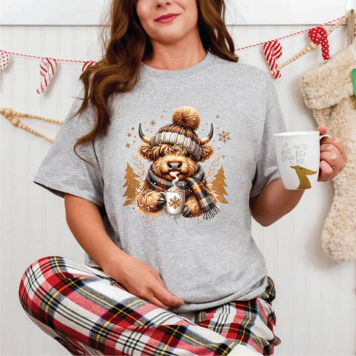 Winter Highland Cow Tees for wholesale by Clover + Cotton Co