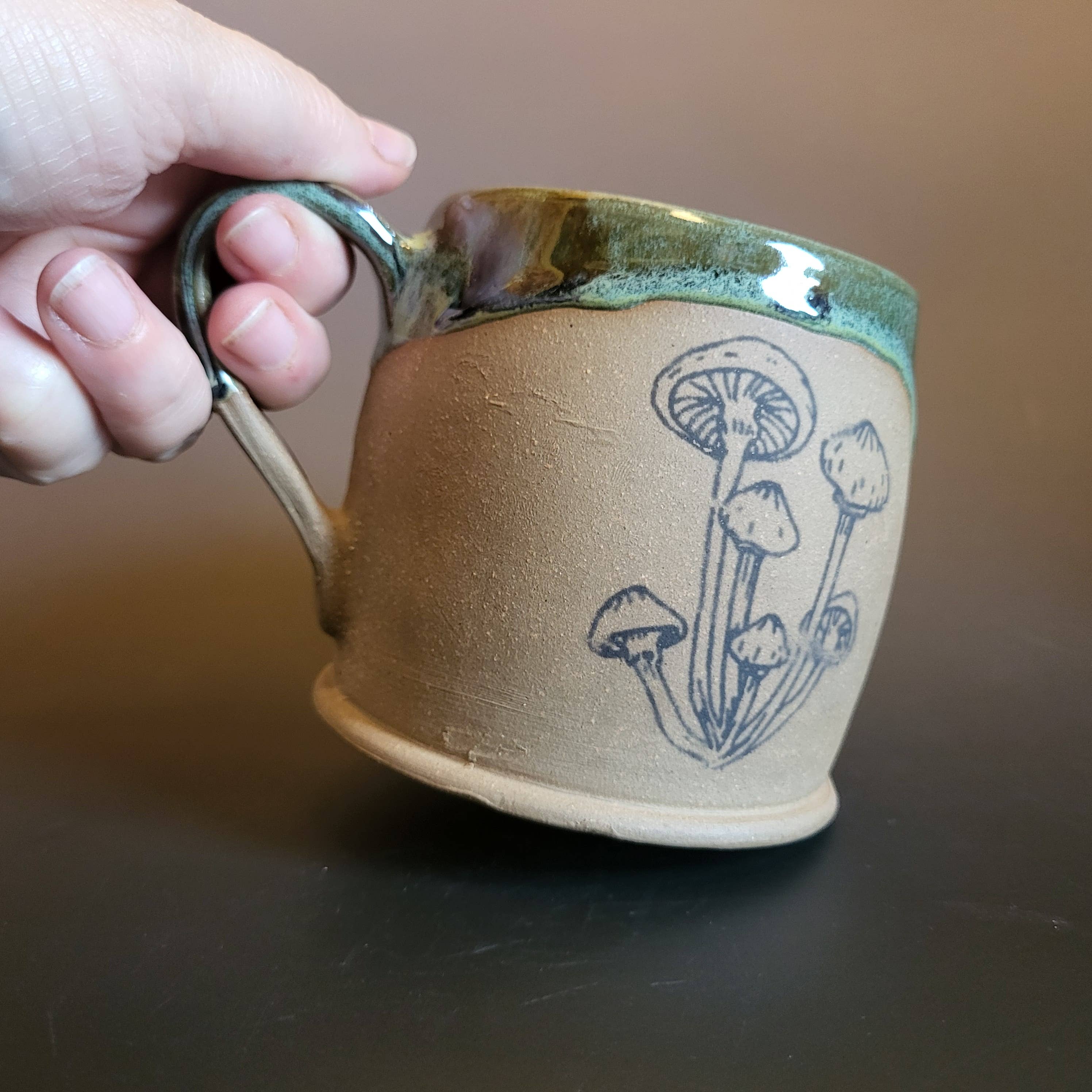 Divine Vessels Pottery - Wholesale Coffee Mug - Mug with Mushroom Emblem with Green and Brown glaze 1