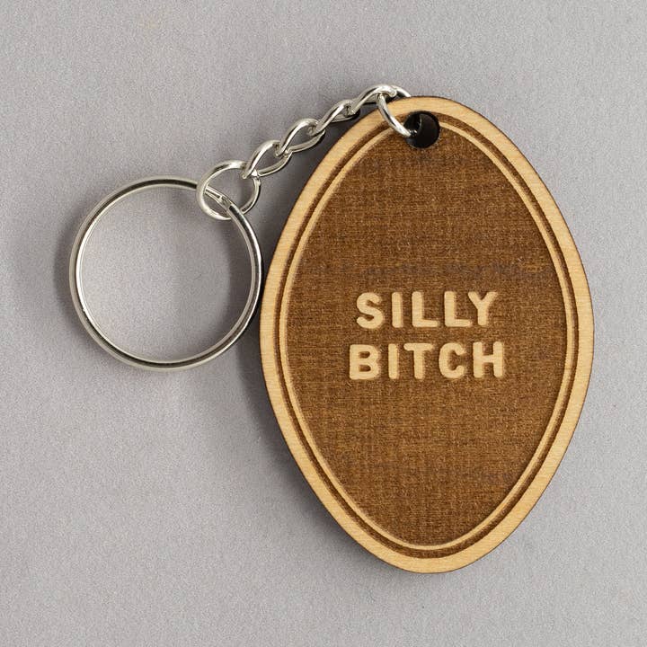 Silly Bitch - River Pebble Keychain for wholesale by TIMBERMADE