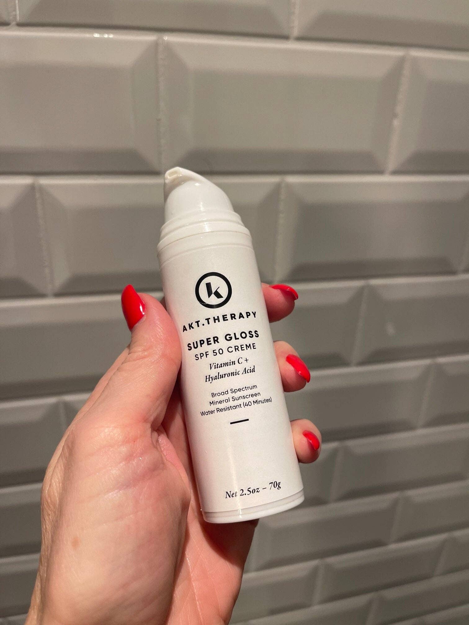 Un tinted Super Gloss SPF 50 Sunscreen for wholesale on Faire3