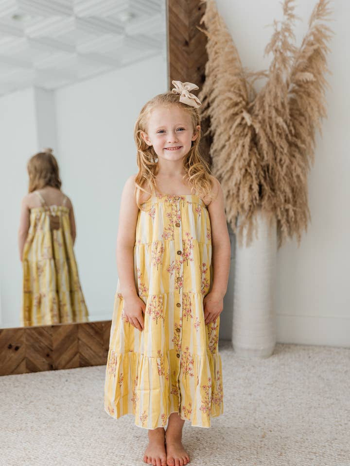 Abito a balze con stampa floreale rosa e gialla per la vendita all'ingrosso da parte di Yo Baby