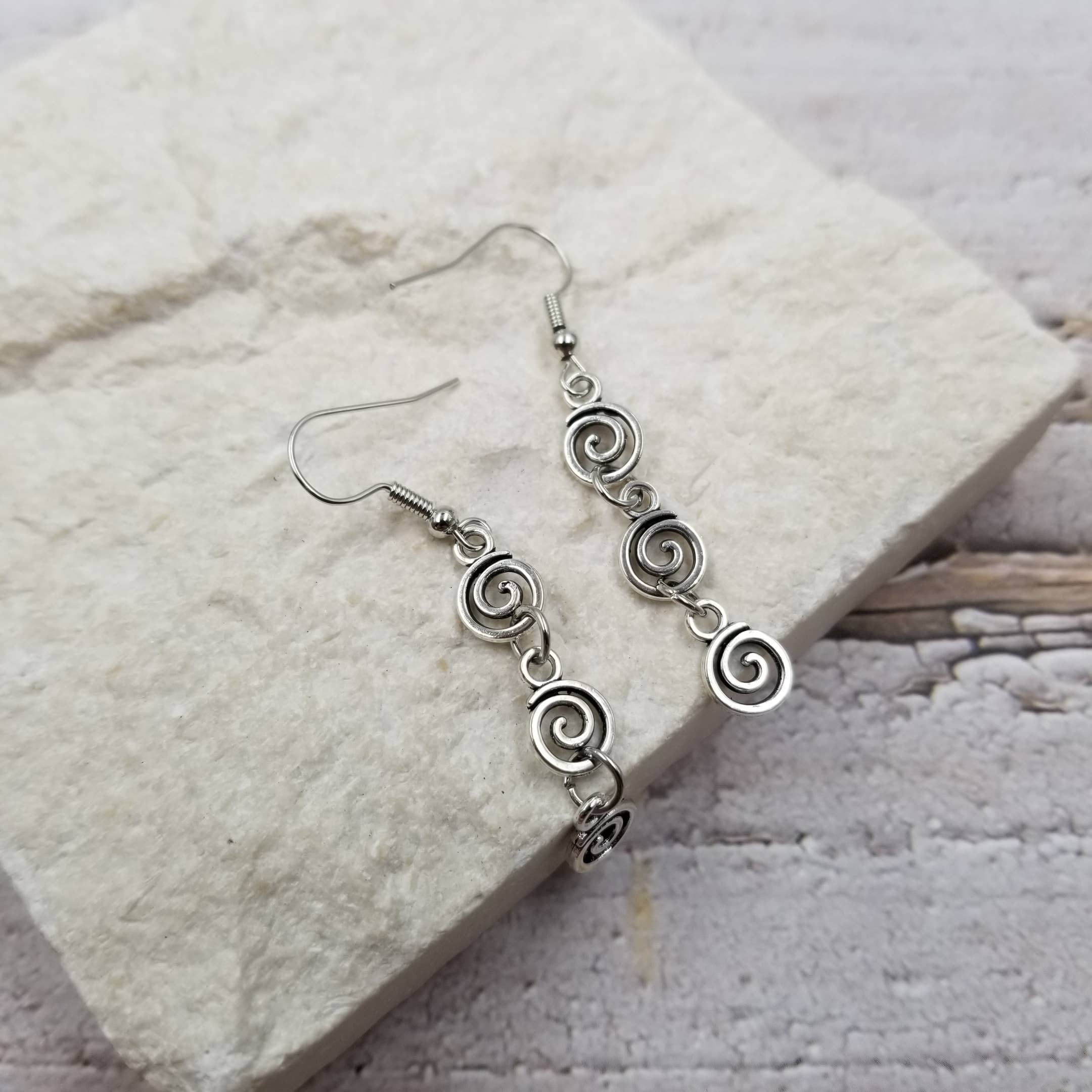 Treasure Wholesale - Wholesale Clip-On Earrings - Silver Vortex Earrings1
