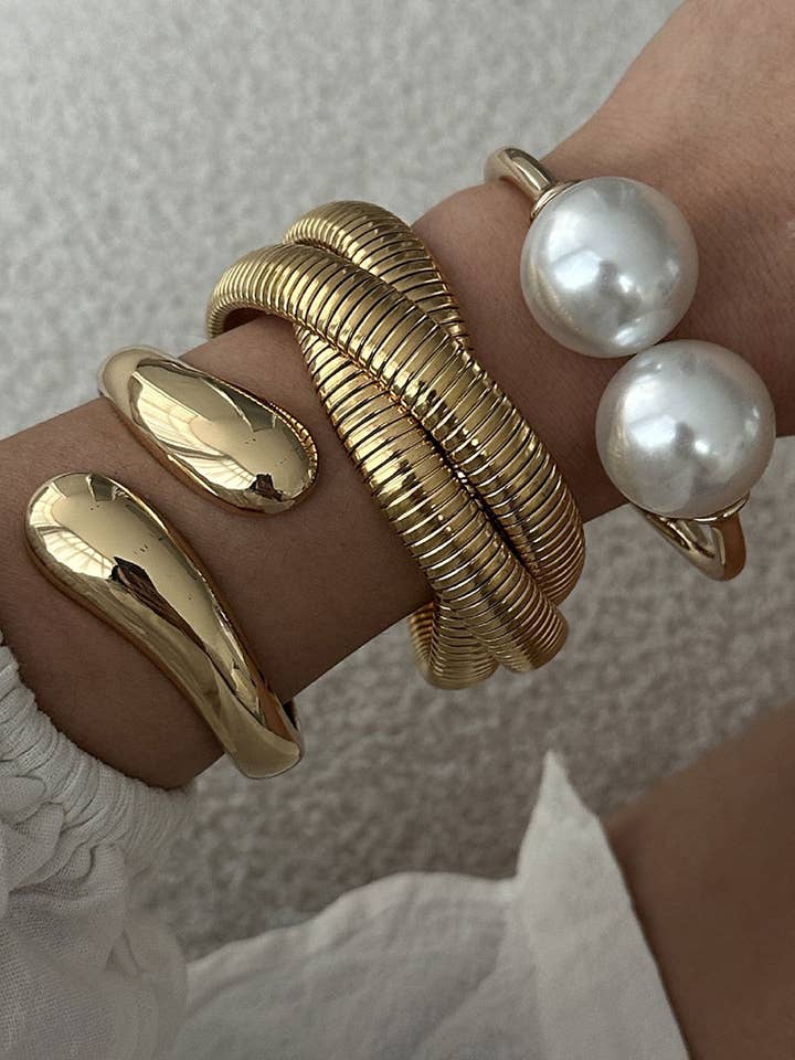 Bracelet en spirale Serpent doré pour la vente par Lyonlee