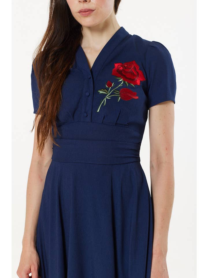 Timeless London – wholesale Dress – Women's – Reema Short Sleeve Midi Dress Navy with Red Rose Embroidery1