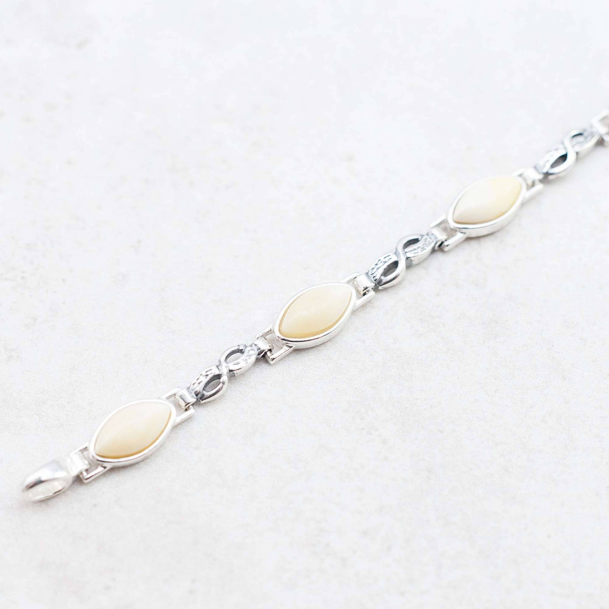 Marcin Waryszak - Vendita all'ingrosso Bracciali tennis - Bracciale in ambra caramellata, braccialetto in argento con maglie a forma di infinito4