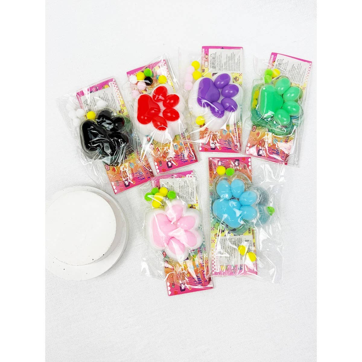 MIX COLOR Addicting Paw Pinch Squishy Toy for wholesale on Faire2