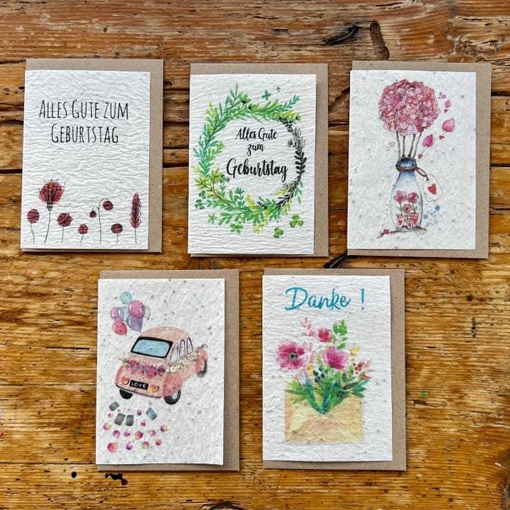 Seeded greeting cards to be planted in German for wholesale by Les cartes de Lulu