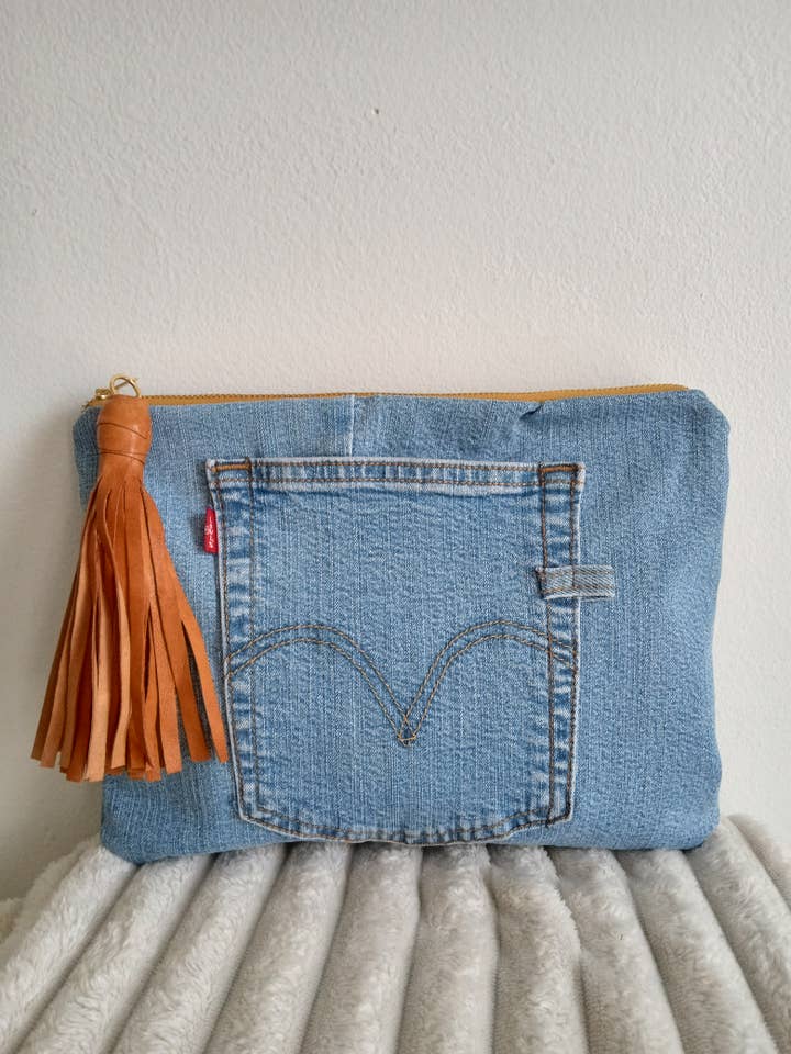 Upcycled Levi Denim Clutch with Tassel for wholesale by NKHenry