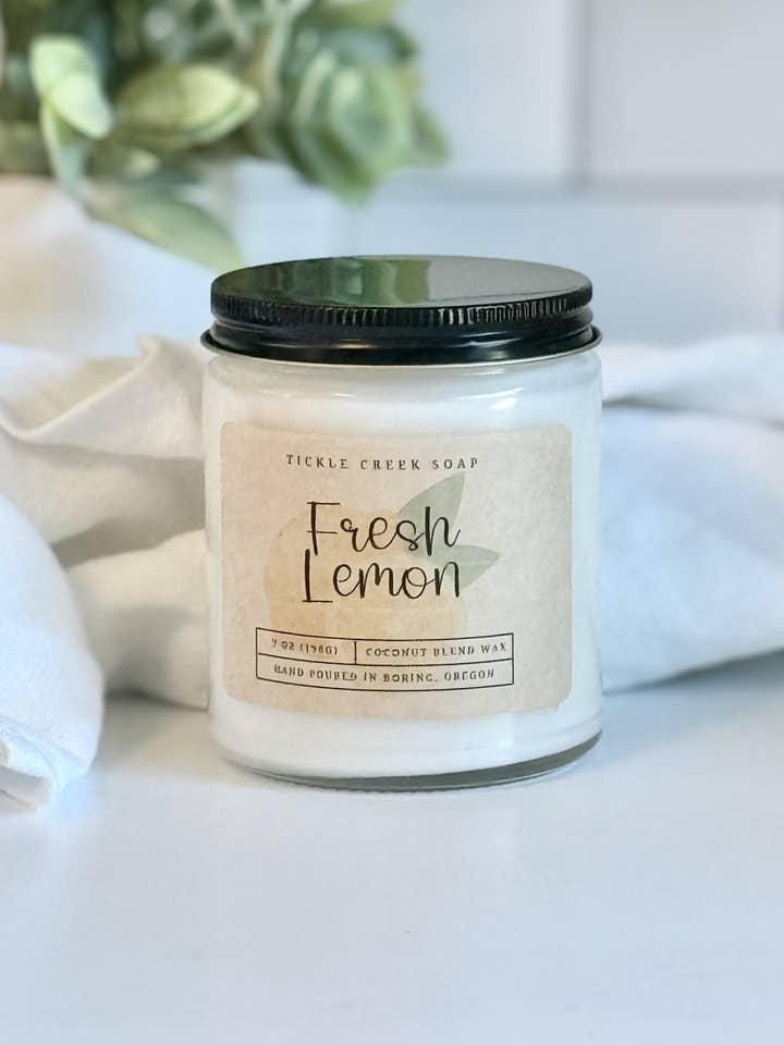 Fresh Lemon 7 oz. Clear Glass Jar Coconut Apricot Candle for wholesale by Tickle Creek Soap