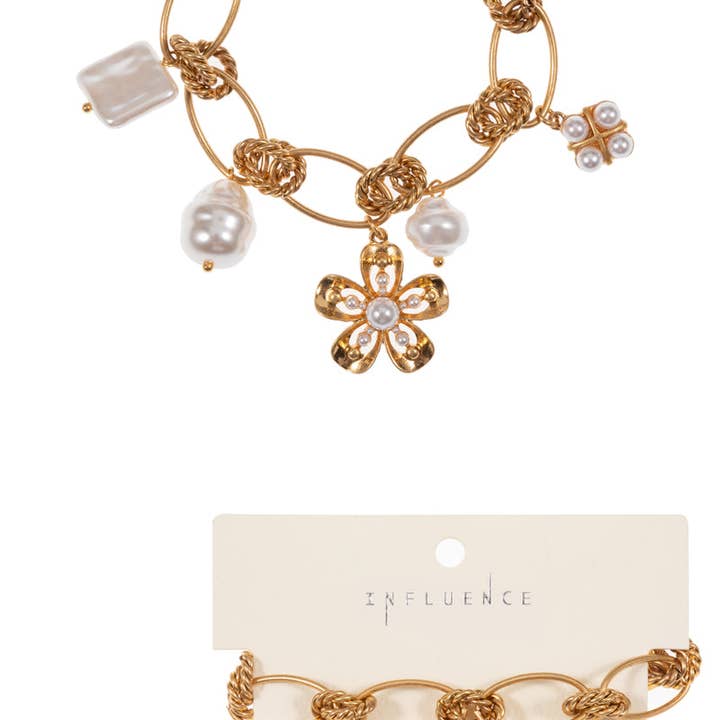 VG FLOWER SHAPED VINTAGE PEARL CHARM CLASP BRACELET for wholesale on Faire