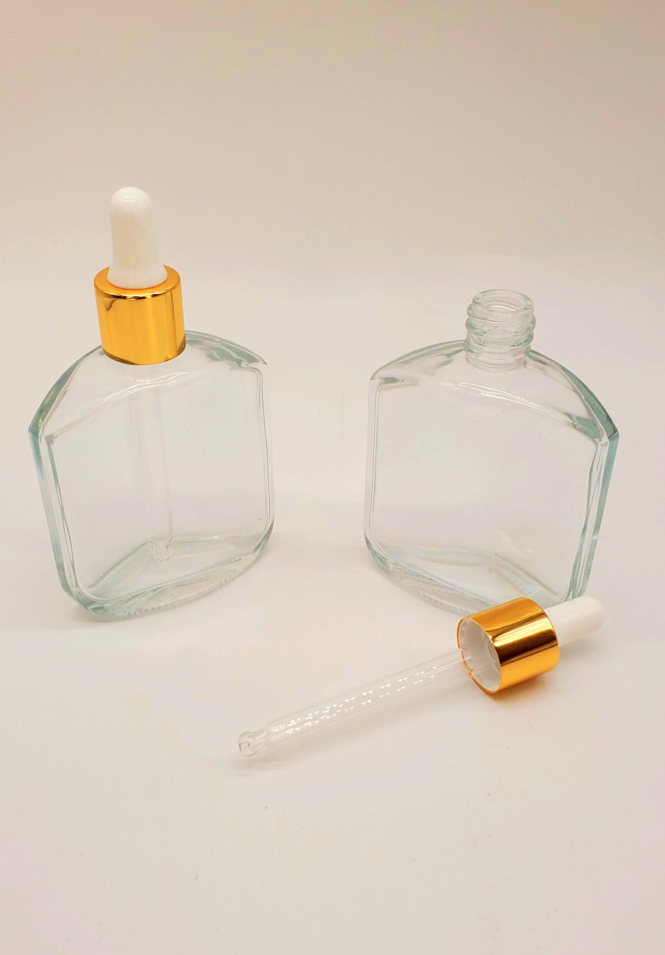 Ameelah Essentials - Wholesale Essential Oil Holder - (10) 2 oz Clear Glass Bottle w/ Shiny Gold Band & White Tip