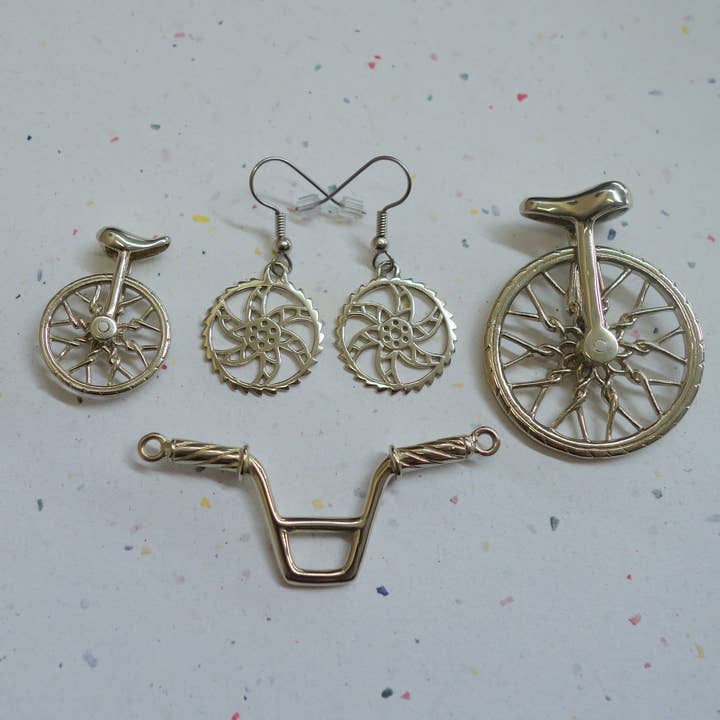 Ajmer by Jodi - Wholesale Individual charm/pendant - Small Lotus Spoke Unicycle Pendant ~ White Brass5