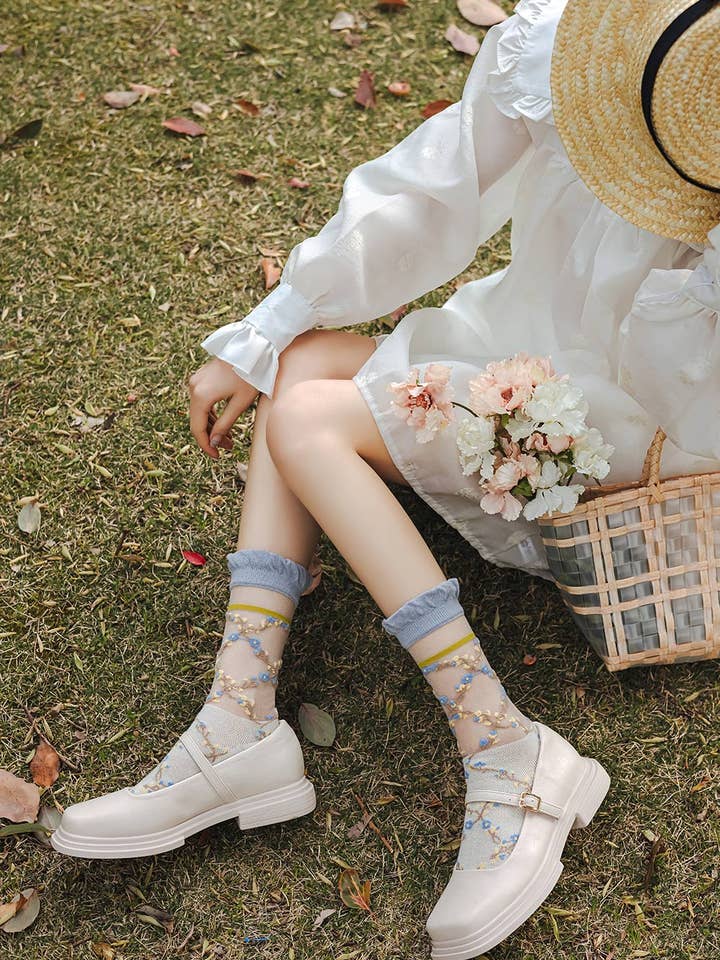 Sheer socks with blue flowers 💙🌼 for wholesale on Faire2