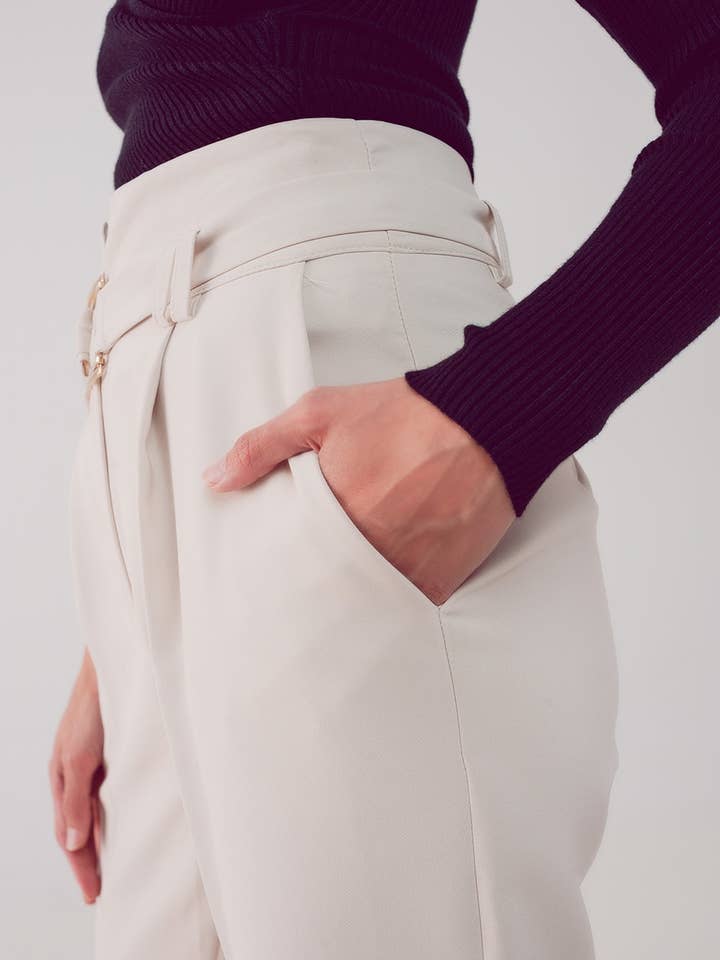 White cigarette pants with paper-bag waist in cream for wholesale on Faire