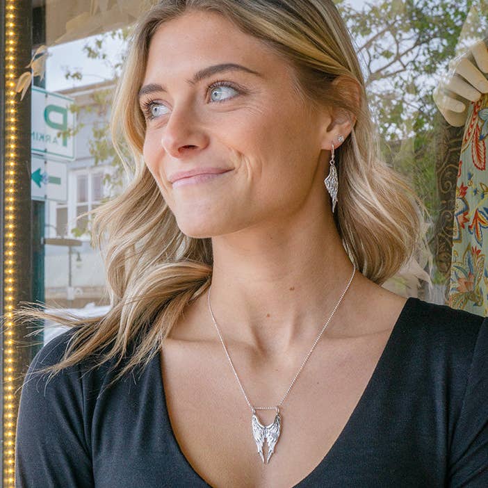 Silver Double Angel Wings Pendant for wholesale on Faire3