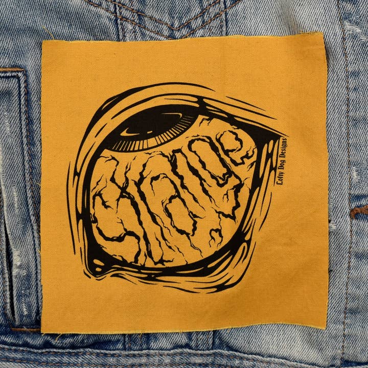 Strange Patch for wholesale by Lofty Dog Designs