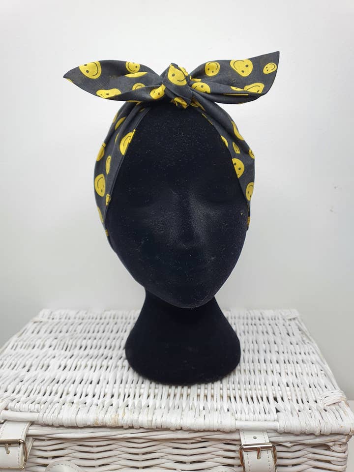 Smiley face yellow and black 90s Headscarf hair wrap AyeAye for wholesale by Aye Aye