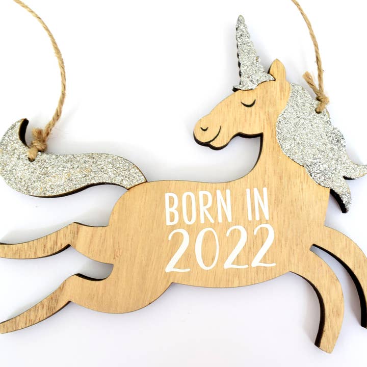 BORN IN 2022 Hanging Unicorn Plaque. Nursery Wall Decor Gift for wholesale by Amaya Rose Ltd.