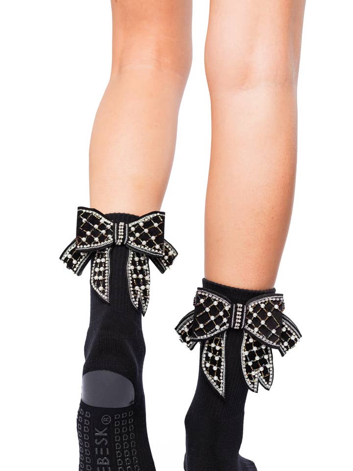 Anna gripstrumpa med rosett för wholesale av Arebesk