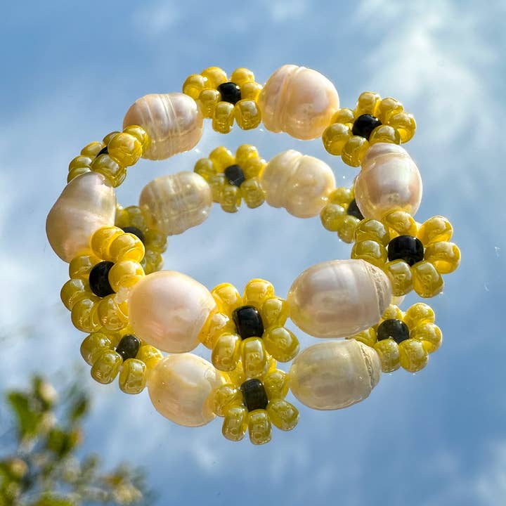 Blomring "Sunny" med solrosor och sötvattenspärlor för wholesale av cool people club