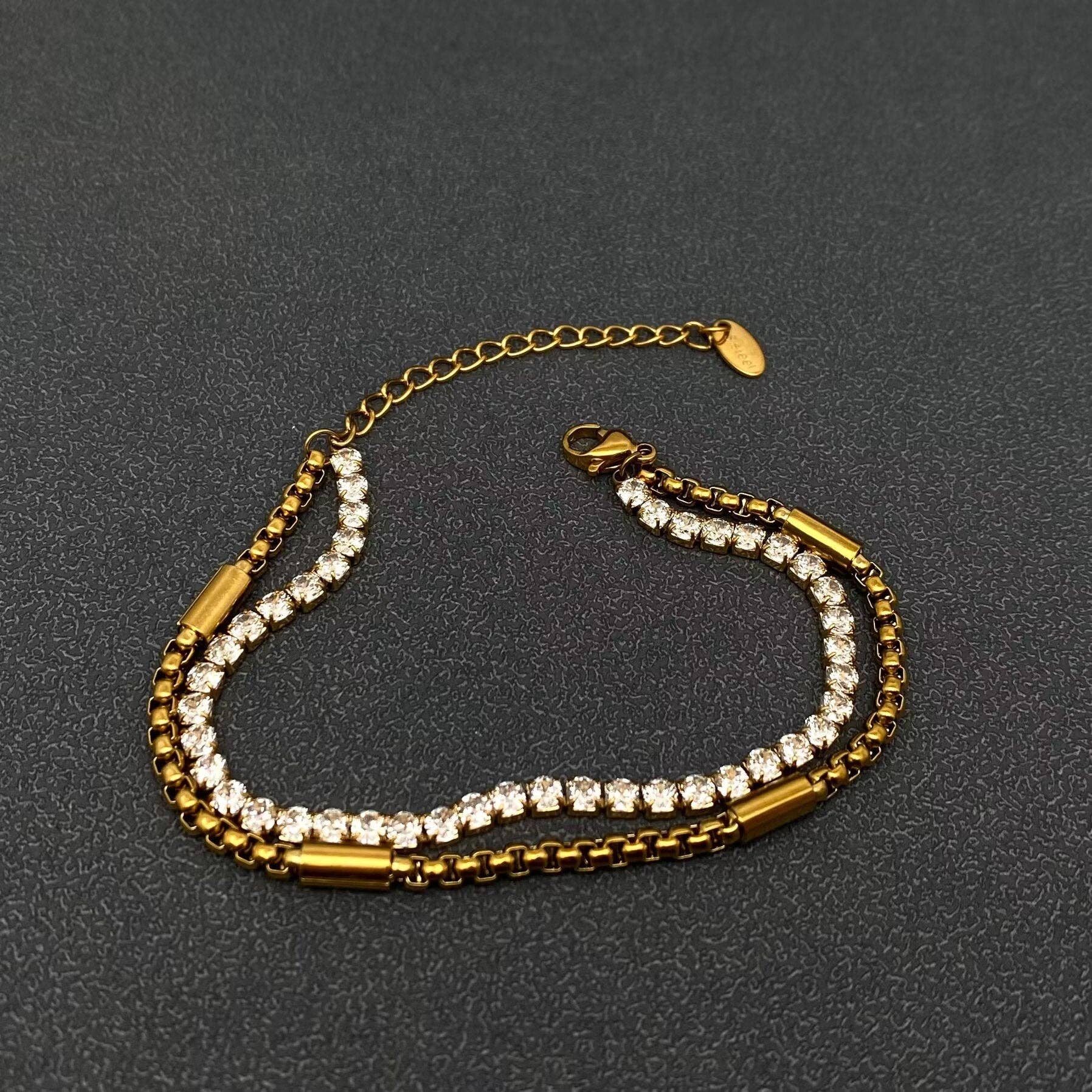 Mio Queena - Vente Bracelets maillon et chaîne - Bracelet à double couche en acier inoxydable plaqué or 18K avec chaîne incrustée de CZ - FGS1